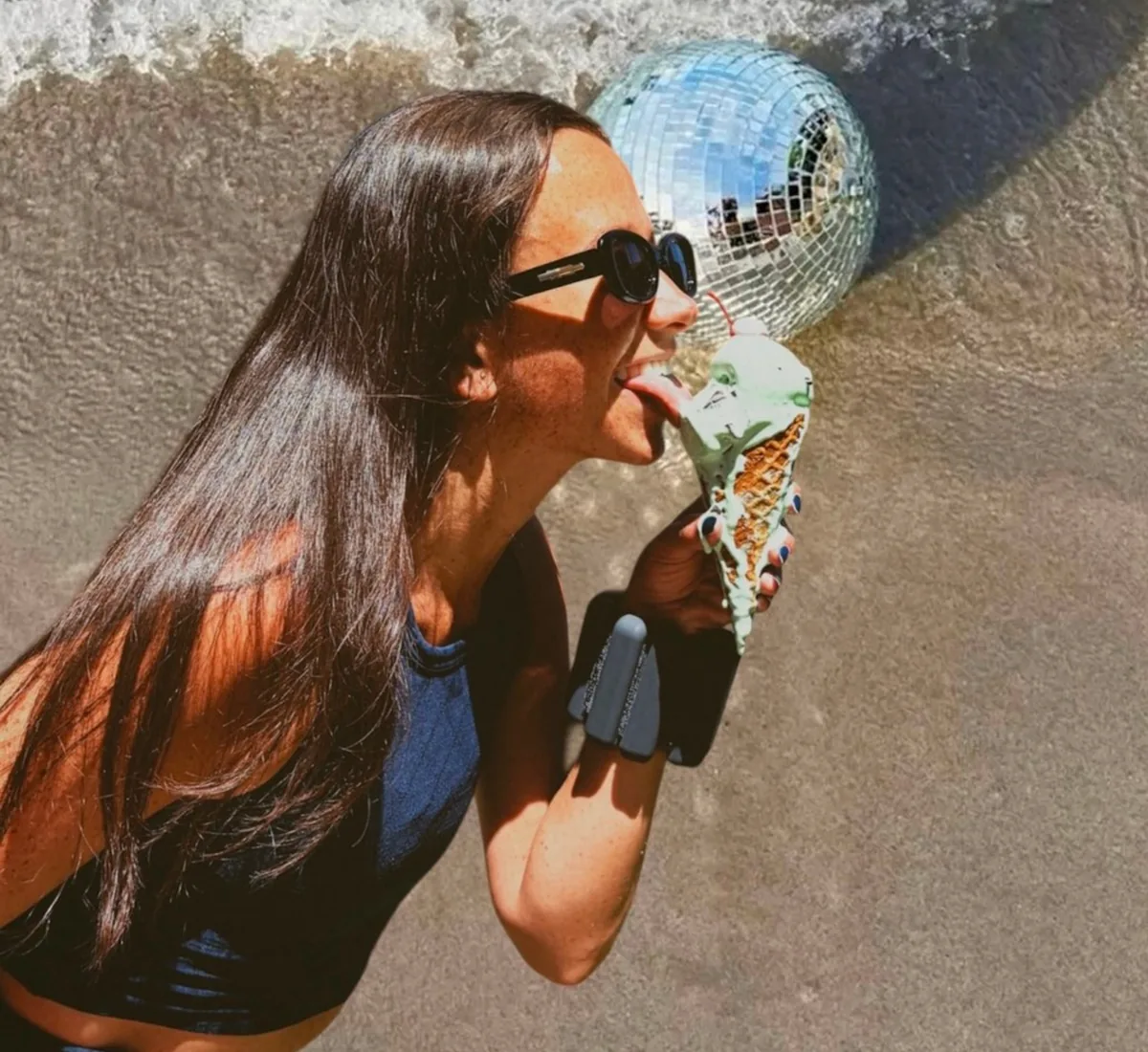 Disco ball and ice cream at the beach